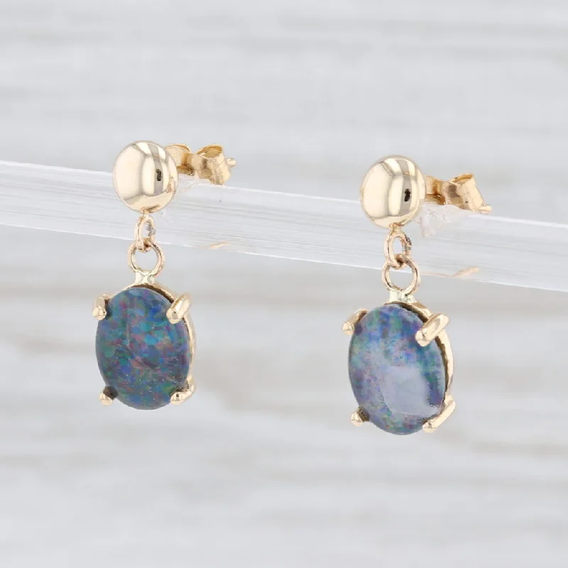 women's sapphire drop earrings -Rainbow Flecked Blue Synthetic Opal Drop Earrings 14k Yellow Gold Oval Solitaire